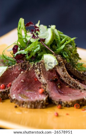 Seared venison with a peppercorn and zesty lime salad