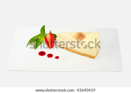 White chocolate cheesecake with strawberry coulis