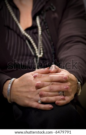 Mature lady with hands on knee