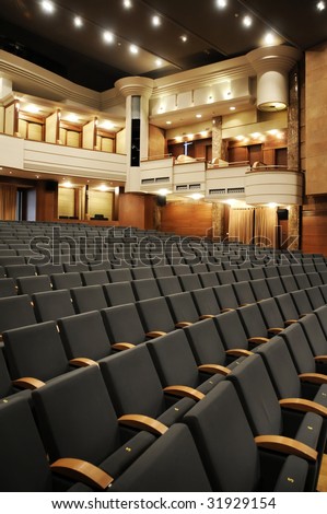 Empty chairs at cinema or theater hall