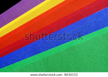 Paper Colors - extreme macro showing details and texture of brightly colored printer paper.