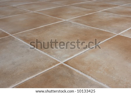Ceramic tile background.  Close-up of newly installed tile with natural colored grout.
