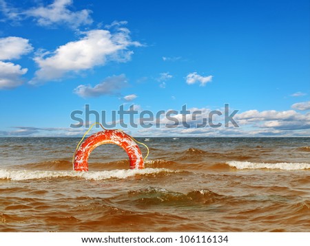 lifebuoy ring in the sea  under blue sky