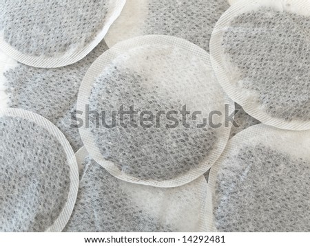 Photo of the many round tea bags background