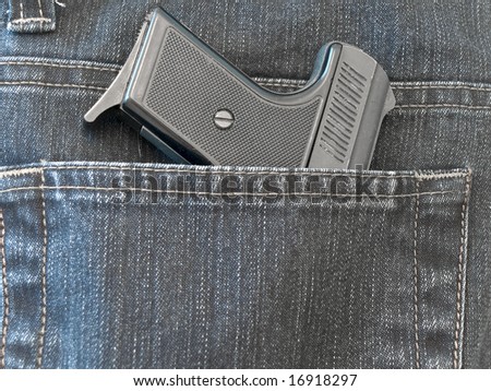 photo of the jeans pocket with pistol