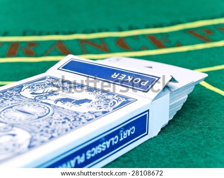 card deck on the playing table in the casino