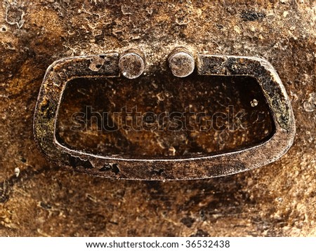 Photo of the old rusty background with handle