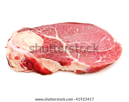 Big piece of raw meat against the white background
