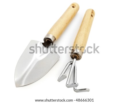 Gardening Tools on Different Gardening Tools Against White Background Stock Photo