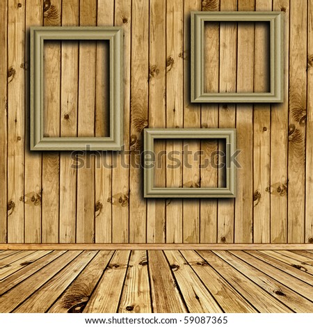Photo of empty natural wooden interior with empty frames at wall