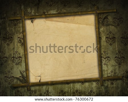 grunge wall with bamboo frame and old paper