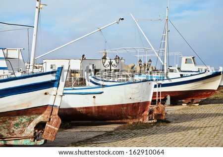 Boats On The Shore In The Fishing Port