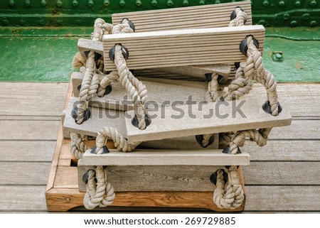Folded Wooden Ladder on Board