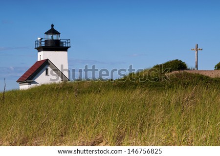 Long Point Light can be found from a two hour hike from Provincetown. There is a cross memorial on a hill nearby.
