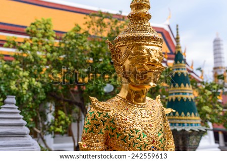 Golden Thai Giant guardian demon statue at WAT PRA KEAW , Thailand