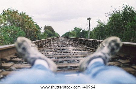 My feet and railroad tracks along I-36 in TX