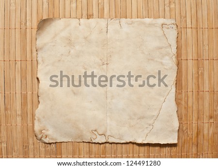 Paper on bamboo background