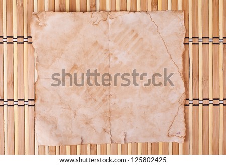 Paper on bamboo background