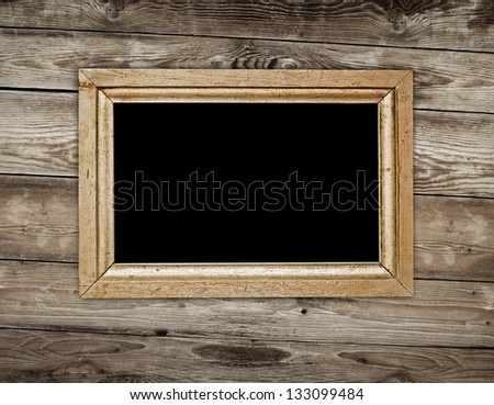 Vintage frame on wood background