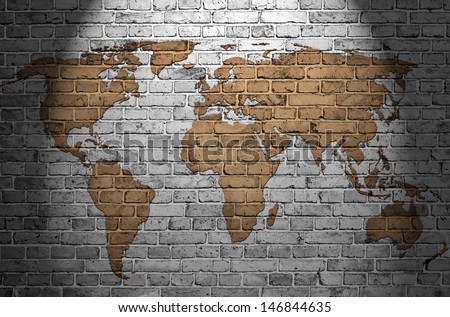 world map on old brick wall