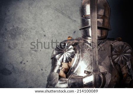 knight wearing armor and holding two-handed sword