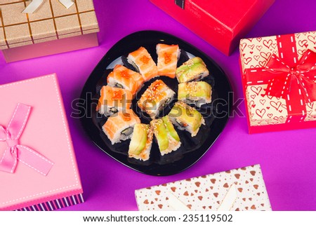 Maki sushi on purple background