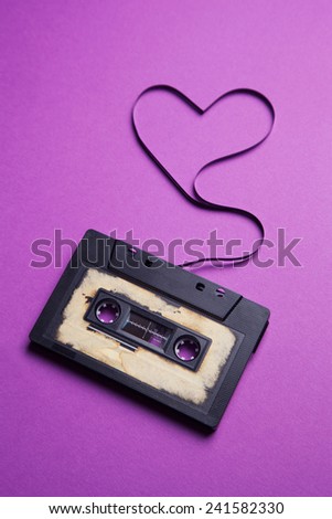 audio cassette with magnetic tape in shape of heart