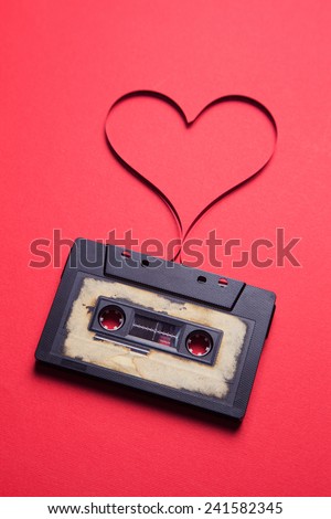 audio cassette with magnetic tape in shape of heart