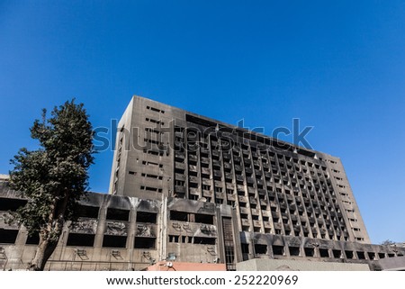 CAIRO, EGYPT - JAN 31, 2015: Building of the National Council for Women and the National Democratic Party headquarters burnt during the Egyptian Revolution of January 2011