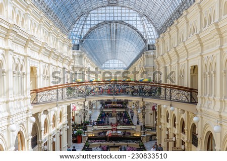 MOSCOW - MAY 18: Interior of the Main Universal Store (GUM) on May 18, 2014 in Moscow. GUM is the large 3-story shopping center and great example of Russian architecture by Vladimir Shukhov.