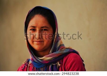LEH, INDIA. JUNE 15, 2012 : The muslim young woman smiles at Hunder village in state of Jammu and Kashmir near India-Pakistan border , North of India