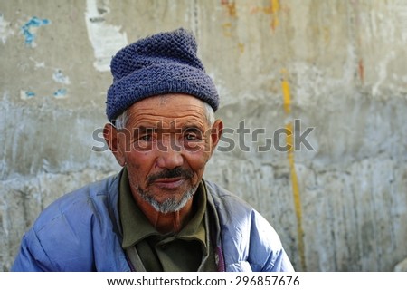 LEH, INDIA - June 12, 2012: The old muslim man on the local market at Leh,Jammu & Kashmir, Northern India