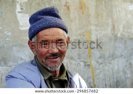 LEH, INDIA - June 12, 2012: The old muslim man on the local market at Leh,Jammu & Kashmir, Northern India