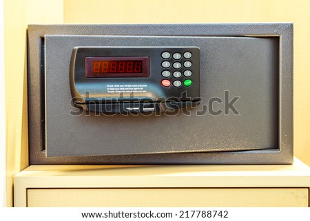 Safe box with electronic lock in the hotel