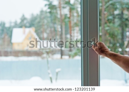 man opens the window
