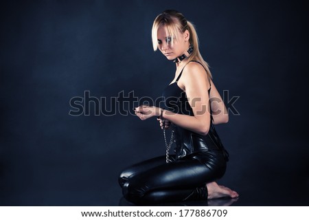 obedient slave woman in handcuffs