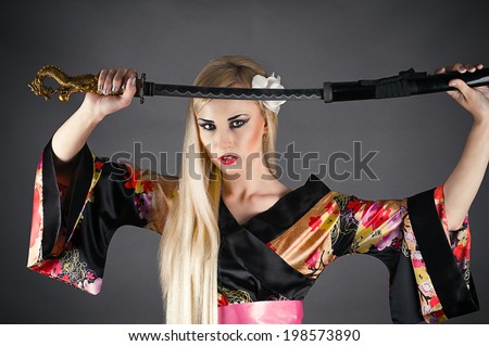 cute woman draws her sword