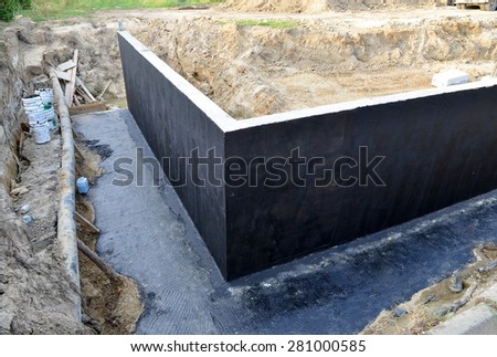 construction of concrete foundation of building for a new house