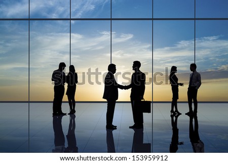Business people handshaking Business people handshaking