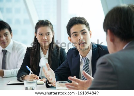 Business people in meeting room