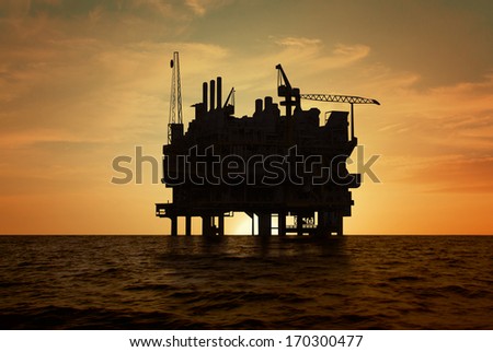 Silhouette shot of oil production platform
