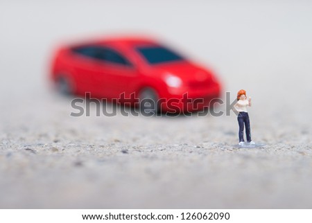 red car and woman