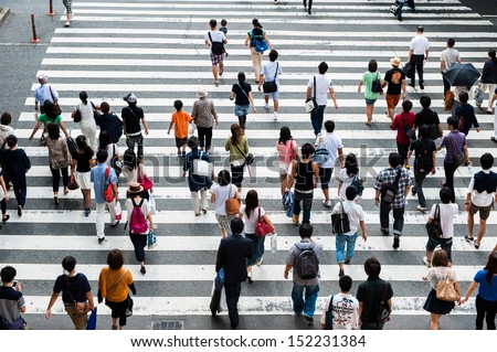 People across the crosswalk