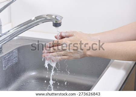 Wash your hands with water