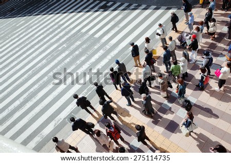 People who walk the crosswalk to dusk