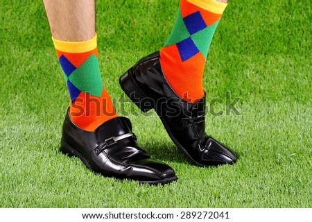 Colorful socks, business shoes