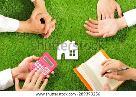 House miniature and hand,Green turf
