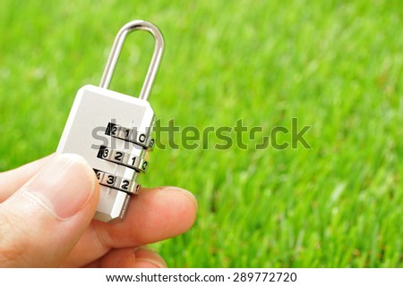 Silver key to dial up. Green background