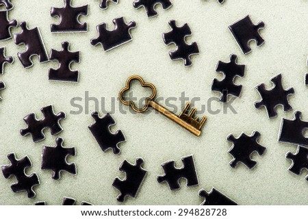 Key and black puzzle