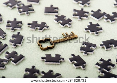 Key and black puzzle